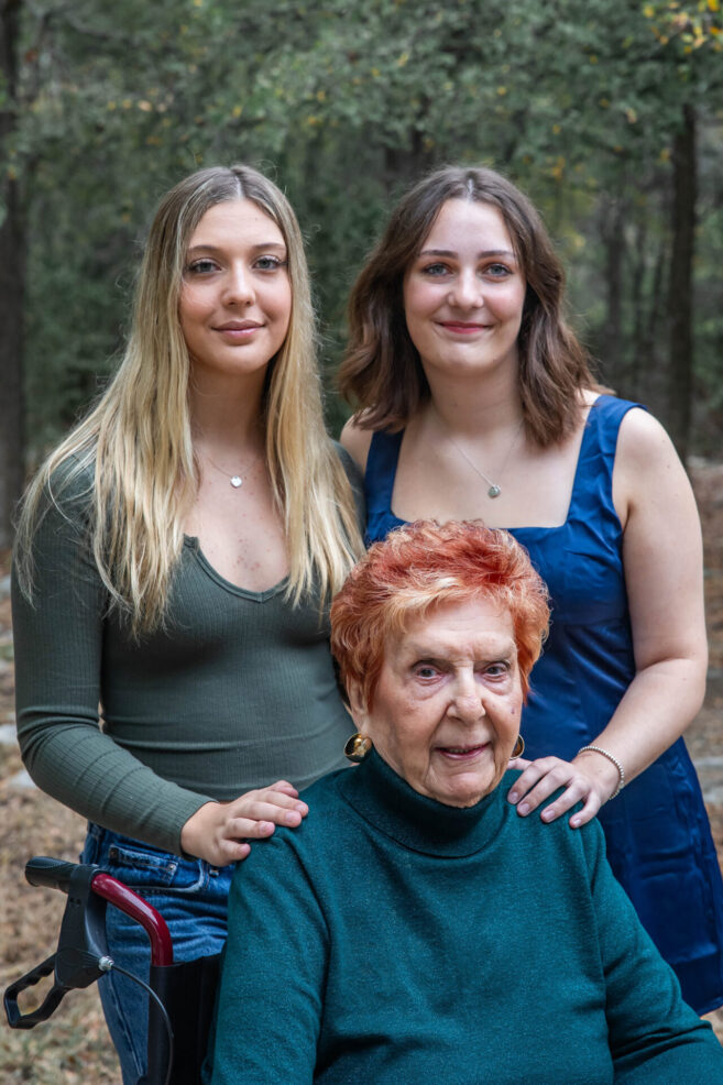 grandmother with granddaughters at family photo session