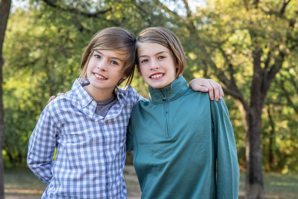 brothers at family photo shoot at the park in austin